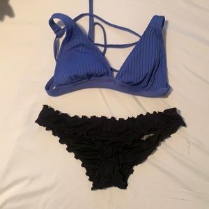 Size small black and blue swimsuit